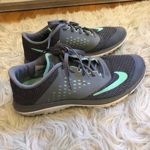Grey Nike running shoes